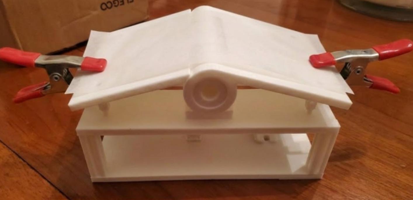Physical proof-of-concept model of the spring-loaded hinge flexion rig