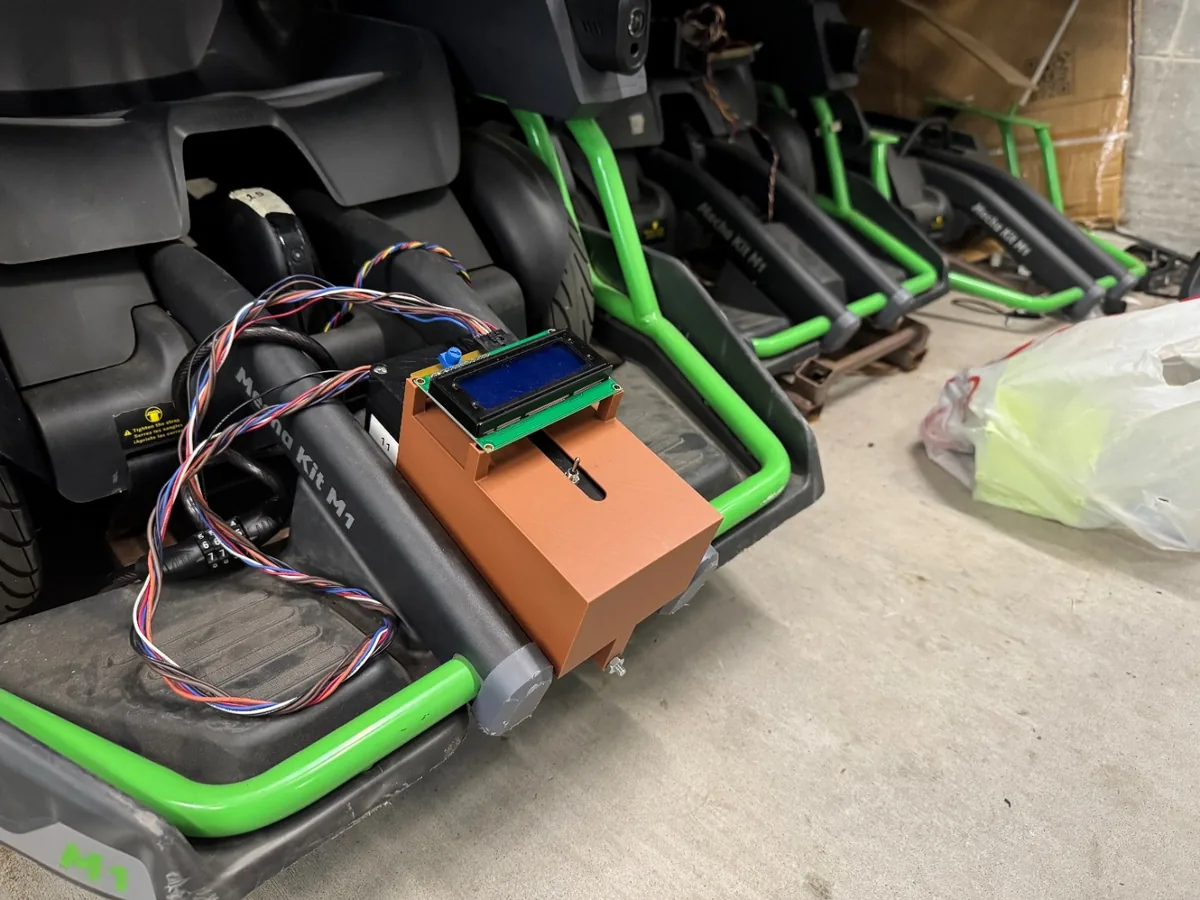 FDM-printed electronics and LCD mount installed on the Ninebot frame