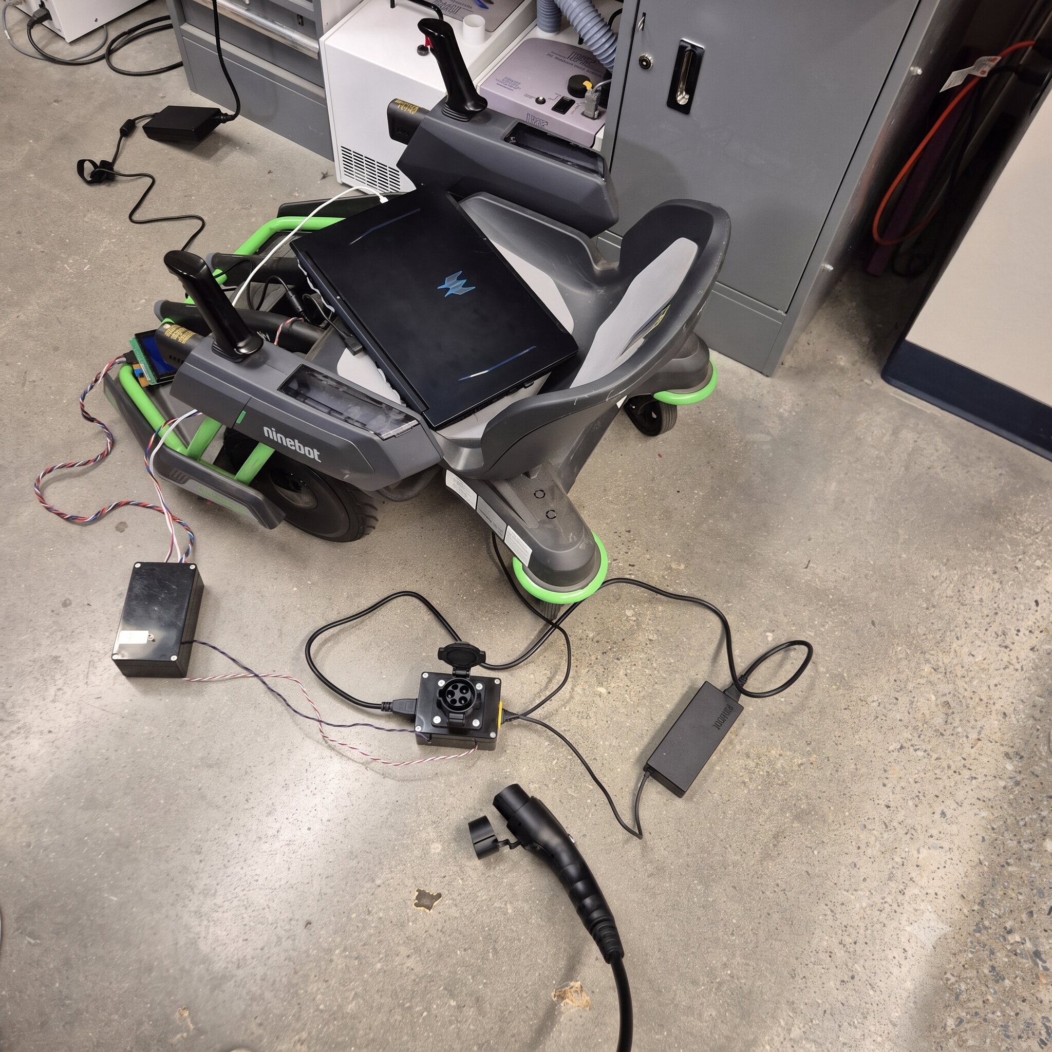 Ninebot Model S and Mecha Kit connected to the J1772 charging test setup